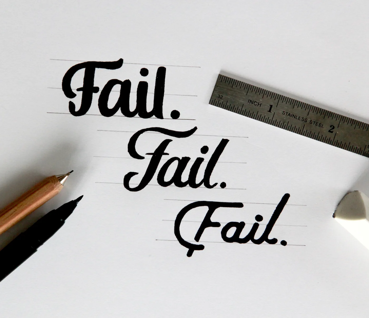 Fail. Fail. Fail.. Lettering by hand.