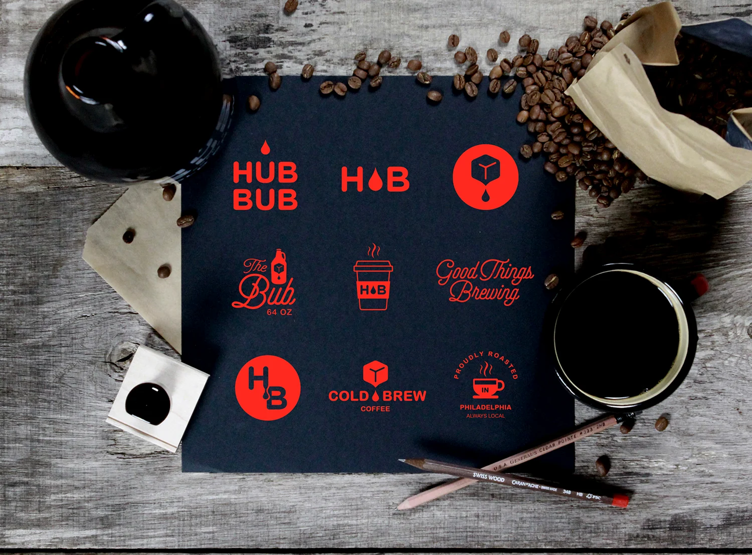 The marks on navy, coffee and beans around them