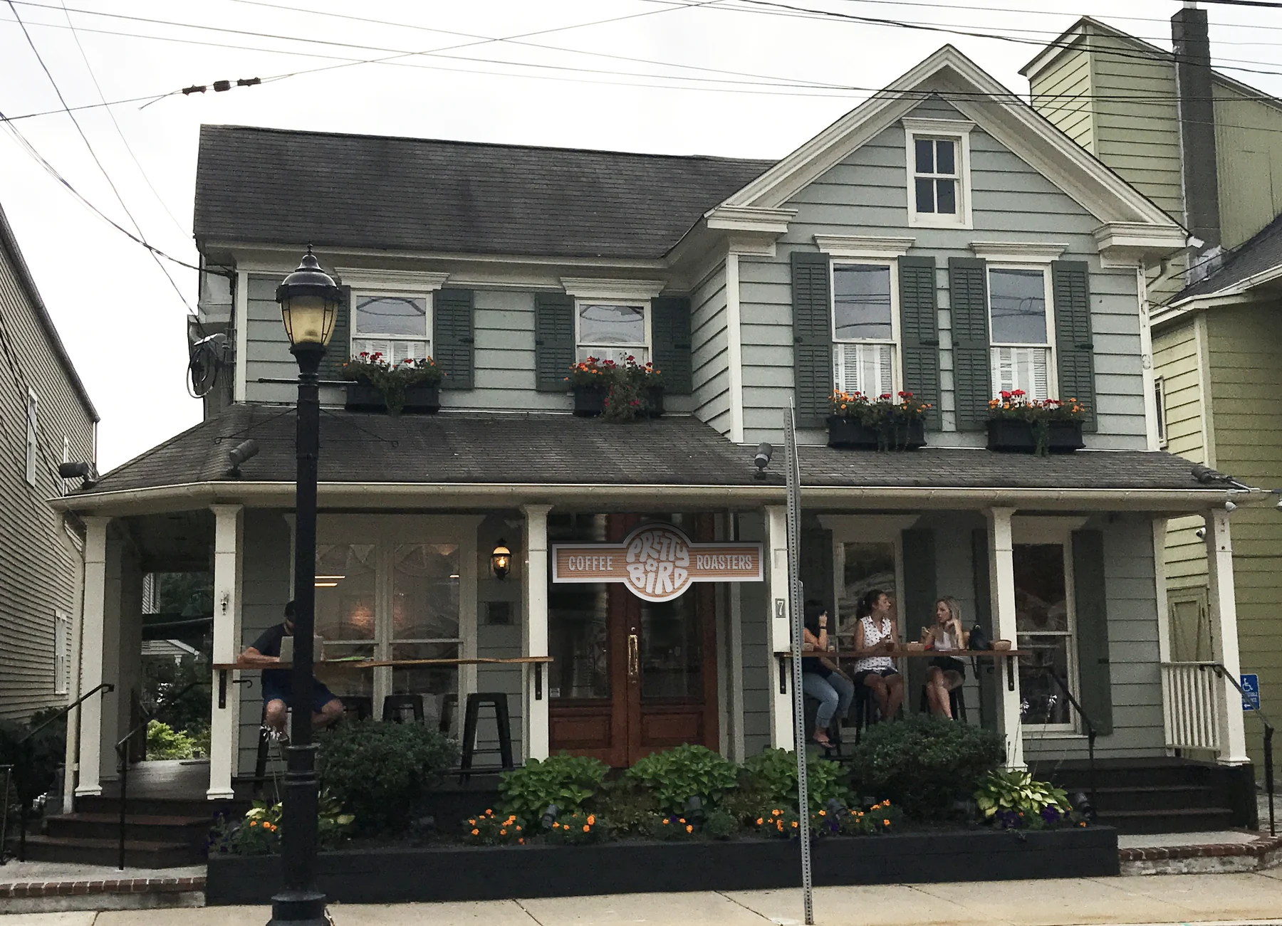 The shop with the sign in solid wood